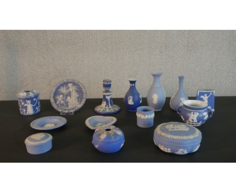 A collection of Wedgwood Jasperware items, including vases, boxes and covers, a candlestick and dishes, together with similar