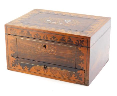 A 19thC rosewood travelling vanity box, of rectangular form, the centre inlaid with an outer floral decoration and inset with