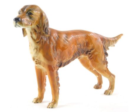 A Goebel Hummel figure of a setter 1968, impressed and printed marks beneath, 17cm high.