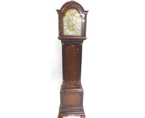 A late 19thC mahogany longcase clock, the arched case surmounted by an orb and eagle finial, with arched dial with raised spa