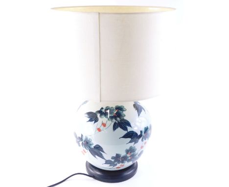 A 20thC oriental style table lamp, with modern shade and electrical fitting, 60cm high.