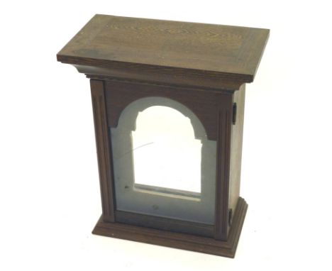 An oak cased longcase clock hood, of rectangular form with plain glass front.