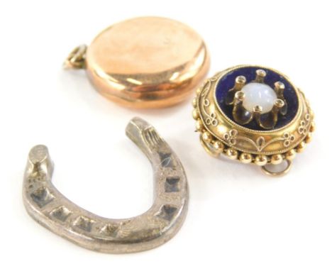 An Edwardian pendant brooch, of circular form, centered by an opal, florally claw set, with a bead outline, plain pin and rin