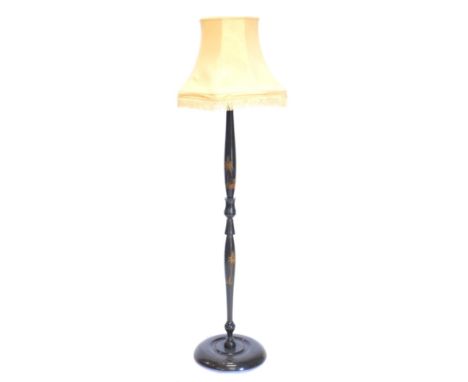 An Eastern carved and stained wooden floor or standard lamp, decorated with boats, building, palm trees, etc., with a shade 1