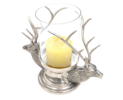 A silvered metal Stags head lamp, with cylindrical shade on stepped base, 38cm high.