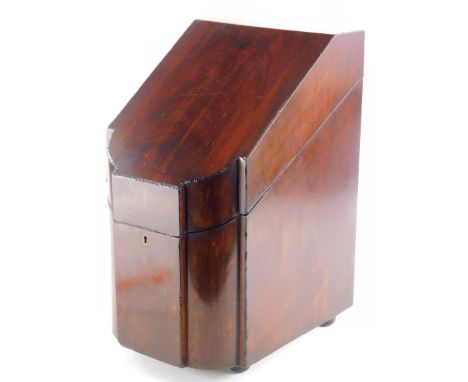 A George III mahogany and ebony strung slope top knife box, the hinged lid enclosing a later fitted interior, on bun feet, 43