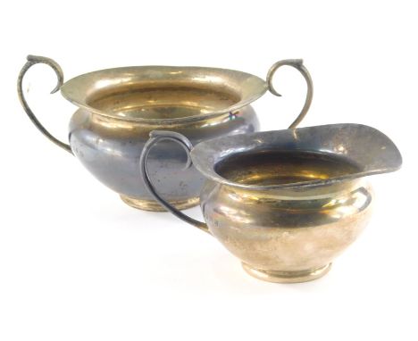 An early 20thC Irish silver part tea service, by T Weir and Sons, comprising of a two handled sugar bowl and jug of bellied c