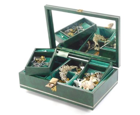 A green leather jewellery box and contents, including various costume jewellery brooches, silver plated chains, tie clips, co