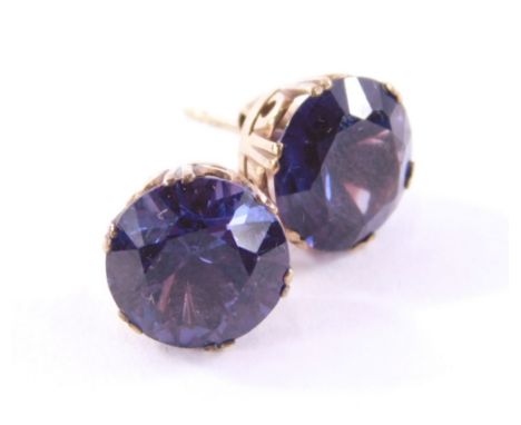 A pair of Alexandrite stud earrings, each set with single circle faceted cut purple/blue Alexandrite stone, approx 5.33cts ea