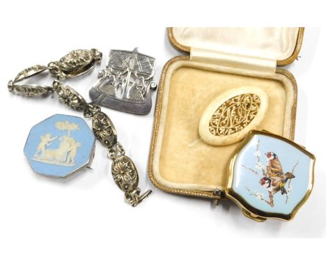A Scandinavian brooch, in the form of figures in a boat, marked 925, 4cm wide, bracelet raised with flower heads, bone brooch