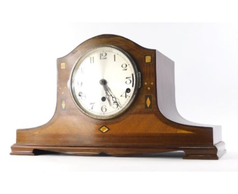 A mid 20thC mahogany Napoleon hat chiming mantel clock, the 14cm diameter, Arabic dial held in a shaped partially inlaid case