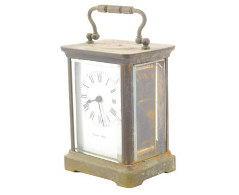 An early 20thC French brass carriage clock, of rectangular form, in a five part glazed case, with 5cm wide Roman numeric dial