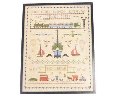A 20thC pictorial alphabetic and numeric sampler, with trains and boats, dated November 1950, 48cm x 36cm.