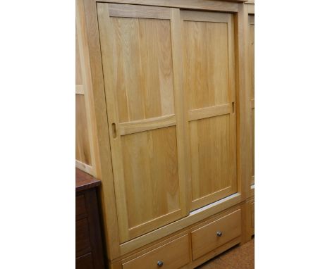 Very good quality light oak double wardrobe with drawers. Must be picked up by 10am Thursday or automatic storage charges wil
