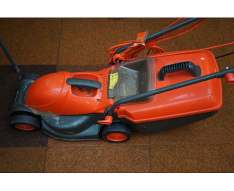 Flymo lawnmower.Must be picked up by 10am Thursday or automatic storage charges will be placed on each item 