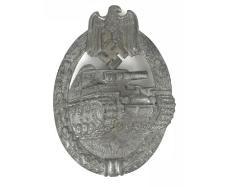 German Third Reich WW2 Army / Waffen SS Panzer Assault Badge.  A good die-stamped grey metal example. Approaching Panzer with