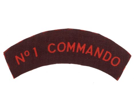 No.1 COMMANDO WW2 Ordnance issued printed cloth shoulder title badge circa 1942-45. Good scarce red sans-serif letters on dar