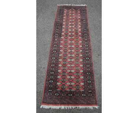 Turkish rug, pink yellow and blue, 199 x 127 cm, and a Pakistan style pink runner, 251 x 79 cm (2)