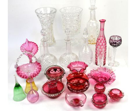 Crystal cut glass pedestal bowl, glass decanters, an amethyst wine goblet with faceted stem, and a quantity of cranberry glas