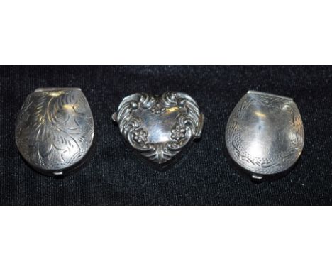 A silver heart shaped patch box, marked 925; others, horseshoe shaped (3)