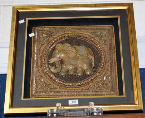 Textiles - a framed Thai panel, an embroidered and embellished elephant, overall measurements approximately 55cm x 55cm