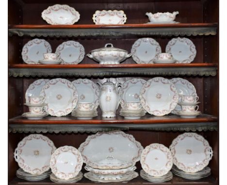 An early 20th century Austrian part dinner and tea service, Bridal Rose pattern, comprising vegetable dishes, serving platter
