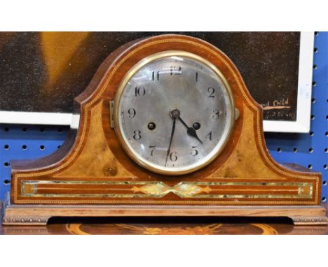 A mahogany mantel clock, silvered dial, Arabic numerals, twin winding holes, the case outlined with boxwood stringing and inl