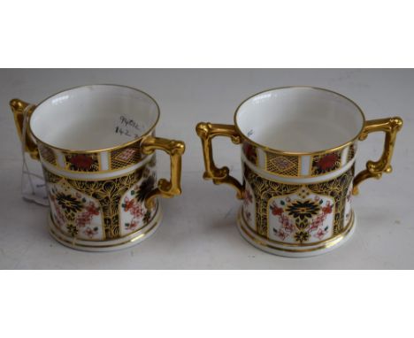 A Royal Crown Derby 1128 pattern two handled loving cup, printed mark; another, both first quality (2)