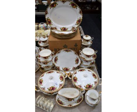 A Royal Albert Old Country Roses pattern tea and dinner service, including vegetable dishes, sauce boat on stand, soups bowls