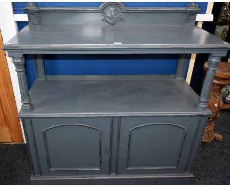 A Victorian painted buffet sideboard, the upper moulded rectangular tier with arched half-gallery centrally applied with a sw