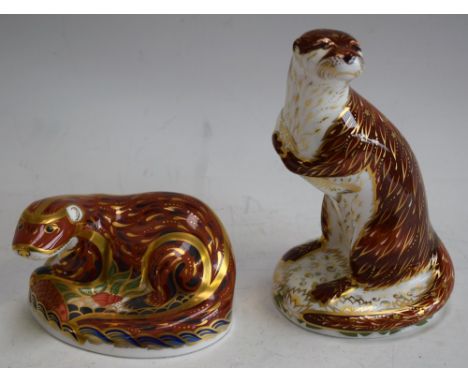 A Royal Crown Derby paperweight, Playful Otter, gold stopper, boxed; another, Otter, gold stopper, boxed (2) Condition Report