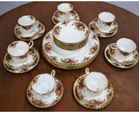 A Royal Albert Old Country Roses pattern part dinner and tea service, including dinner plates, side plates, dessert bowls, cu