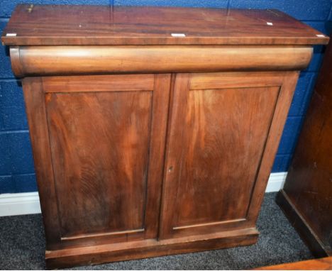 A Victorian mahogany low chiffonier, rectangular top above a frieze drawer and a pair of panel doors enclosing a shelf, plint