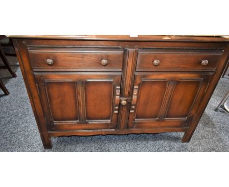 An Ercol Old Colonial sideboard