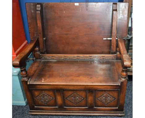 A 17th century style oak monk's bench, 107cm wide