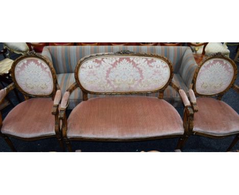 A Louis XVI style sofa; a pair of conforming armchairs (3)