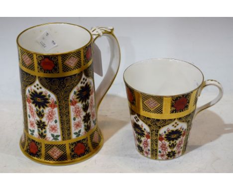 A Royal Crown Derby 1128 pattern tankard, approx 14cm in height, first quality; a similar beaker, first quality (2) 