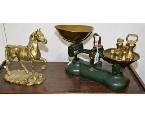 A set of Librasco kitchen scales with brass pan and bell weights; a solid cast brass model of a standing horse (2)