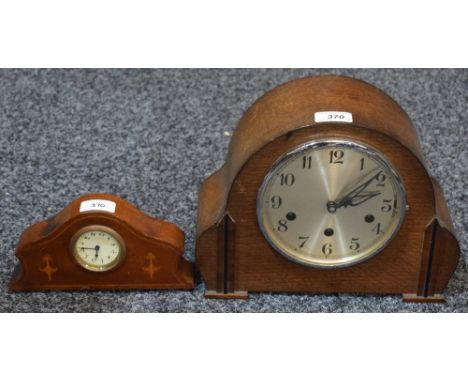 An oak cased Westminster chime clock, eight day movement; an early 20th century mantel clock; an oak canteen, fitted with EPN