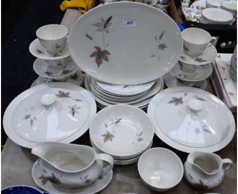 A Royal Doulton Tumbling Leaves pattern dinner and tea service, including vegetable dishes, oval meat platter, dinner and sid