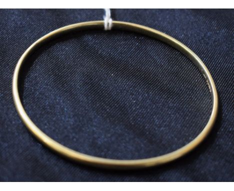 A 9ct gold solid hoop bangle, Chester 1924, 19.4g