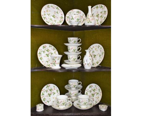 A Wedgwood Wild Strawberry pattern part tea set, comprising eight cups and saucers, assorted tea plates, vases, trinket boxes