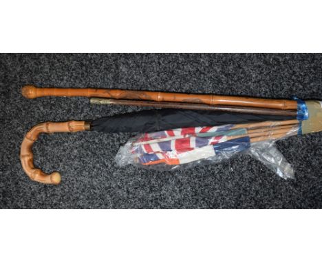 A Chinese carved walking cane, signed, dragon and monkey decoration; a Yorkshire light infantry swagger stick; vintage flags;