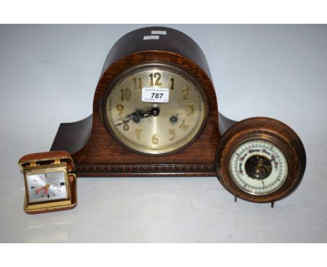 A mid 20th century Franz Hermle Technik oak cased mantel clock; an aneroid barometer; a retro Coral travelling alarm clock (3