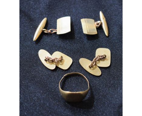 A pair of 9ct gold cufflinks, engine turned, approx 4.2g; a yellow metal signet ring, approx 3.3g; a pair of rolled gold cuff