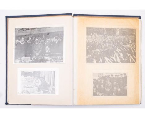 An Album of WWII German picture cards of Adolf Hitler by B H W Hadank, in an associated stamp album. We understand the potent