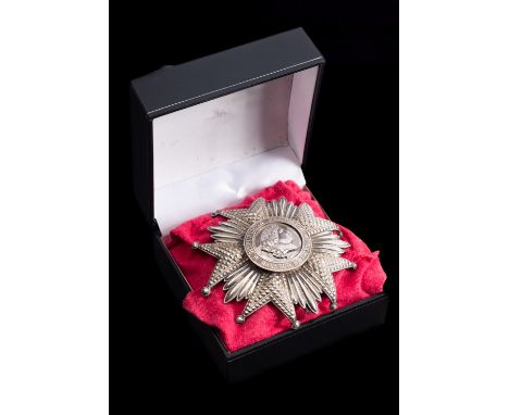 Order of The Legion Of Honour. a silver Grand Officer's breast badge, facetted double ended five pointed star with ball finia