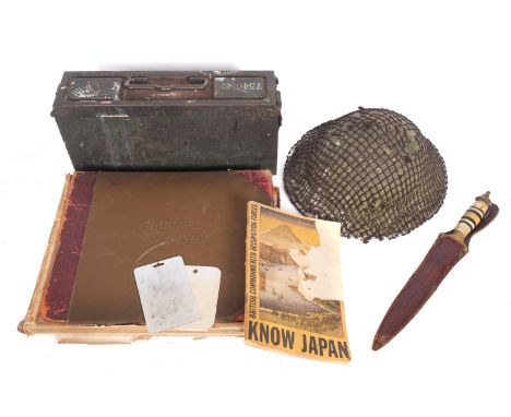 Of WWII Interest. A collection of items belong to Corporal Ronald Hutchings, comprising a Mark I steel helmet with netting an