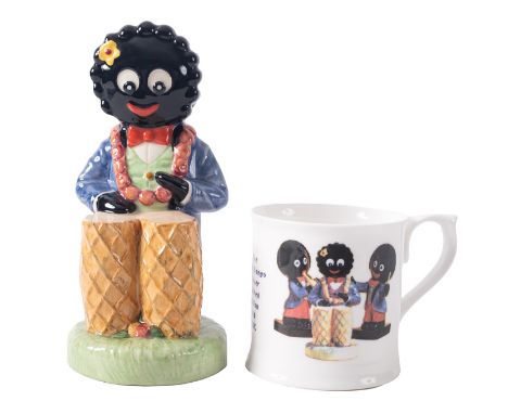 A Royal Nostalgia Ware 'Golly Bongo' figure no. 32/100, 20cm high, together with matching cup (2)* These items are listed on 