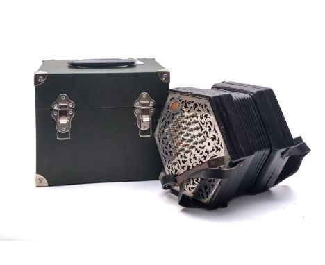 A Wheststone & Co duet system concertina, serial number 26742, with fifty eight metal buttons, hexagonal chrome plated fretwo